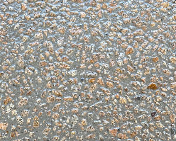 Professional sandblasting Melbourne technician restoring a concrete surface to a clean and even finish.